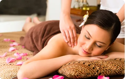 Aromatherapy massage with flowers and candles